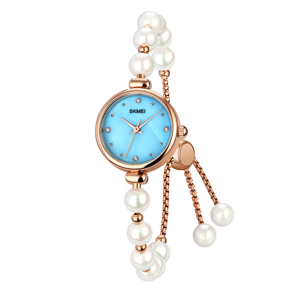 SKMEI 1983 Reloj de pulsera con pulsera de perlas para mujer con caja ultrafina de 8 mm